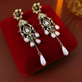 Vintage style drop earrings with white pearls on a red velvet display stand - Style 62# S925 Silver Pin Gold Interlocking Hoop Earrings