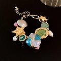Artistic beaded bracelet with pearls, green gemstones and star charms in gold - Artistic Spliced Purple Tone Mix and Match Style