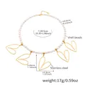 Dettaglio collana di perle da 6 mm con ciondoli a cuore traforati in acciaio inossidabile - 39+5cm / Oro