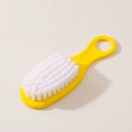 Baby cradle cap brush with yellow plastic handle and soft white nylon bristles for newborns - Yellow Brush