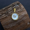 Gold plated circular pendant with white seashell inlay and the letter W detail - Letter W / 17x20mm
