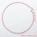 Detail view of 4.5mm rose gold chain necklace with round crystals and lobster clasp closure - Necklace / Rose Gold / White Zirconia