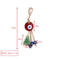 Evil eye and Christmas tree keychain with red disk and green pendant on hemp rope - Red Eye and Christmas Tree Style
