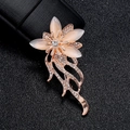 Rose gold flower tassel brooch featuring champagne cat-eye stones and white zircons - Tassel Flower Opal