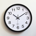 Minimalist 30cm round plastic wall clock with large Arabic numerals and quartz movement - Black