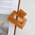 Minimalist amber-colored square hollow hair claw clip in a glossy resin finish - 5.2cm / Light Coffee
