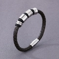 Herenarmband van donkerbruin gevlochten leer met roestvrijstalen kralen en magneetsluiting - Type A 5.5mm Bruine Armband