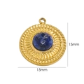 Detail of 15mm sunburst gold pendant with a blue faceted natural stone center - Lapis Lazuli