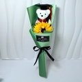 Detail of white graduation bear bouquet with sunflower and black ribbon with text - Green + Sunflower