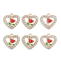 Detail view of heart-shaped red rose alloy pendants with glittering crystals on white background - Heart-Shaped Rose Charm