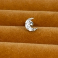 Macro shot of a silver moon-shaped stud earring with cubic zirconia on a velvet tray - Silver (Pave Crescent Moon Y20412-6)