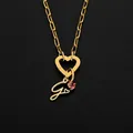 Stainless steel initial G pendant necklace featuring heart clasp and pink stone detail - Letter G