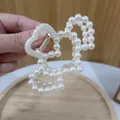 Elegant white pearl hair claw clip with a double heart butterfly design for women - Double Heart Hollow