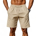 Detail of light khaki linen shorts featuring a drawstring waist and breathable fabric texture - Apricot