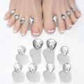 Detailed view of teardrop rhinestones and floral toe dividers for professional nail art - Clear Waterdrop Rhinestone Style (06)