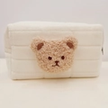 Close-up of soft white quilted plush stationery bag featuring a brown bear embroidery - White (Milk Tea Bear)