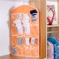 Orange 16-pocket hanging organizer for socks and underwear with transparent PVC windows - Orange