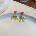 Detalle de pendientes de corazón rosa con flecos de cuentas de cristal multicolor - Corazón Rosa Borla de Dopamina (8#)