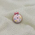 Pink resin donut charm with red bow and colorful sprinkles for DIY keychains - Bow Donut