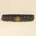 Close-up of bohemian leather belt with gold floral studs and engraved metal buckle - Bronze Black