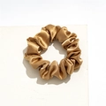 Close-up of golden satin scrunchie showing smooth silk texture and pleated design details - Small Satin Light Coffee