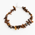 Detail of tiger eye stone bracelet with irregular polished beads and adjustable lobster clasp - Tiger's Eye