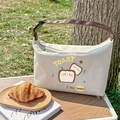 Isolierte Picknicktasche aus Segeltuch mit Toast-Motiv und braunen Tragegriffen - Toast