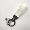 White PU leather woven keychain with dark gray zinc alloy D-ring and metal attachments - White (Gunmetal Hardware)