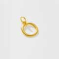 Detailed macro shot of a round gold-plated circular pendant for DIY necklaces - Letter O / 925 Silver