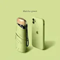 Matcha green compact five-fold travel umbrella compared to phone for portable size - 6-Rib Black Glue UV Gold Handle / Matcha Green