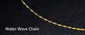 Detailed view of the 18k gold-plated titanium water wave chain necklace with spiral links - Water Wave Chain / Gold