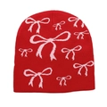 Detailaufnahme der roten Strickmütze mit rosa Schleifenmuster und weicher Wollstruktur - M / Rot