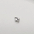 Macro detail of S925 sterling silver heart charm with sparkling cubic zirconia stone - 925 Sterling Silver/Zirconia / Silver Heart