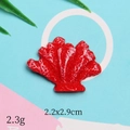 Detailed view of red resin shell charm with dimensions 2.2x2.9cm and 2.3g weight - Red Coral