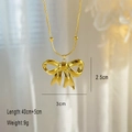 Dimensioni dettagliate della collana a fiocco in acciaio placcato oro 18K con misure - Fiocco Regalo
