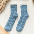 Soft light blue coral fleece socks with white plush trim for warm winter thermal comfort - Blue