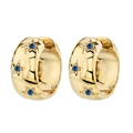 Gold huggie hoop earrings with engraved stars and blue zircon stones on white background - Gold-Blue Zirconia