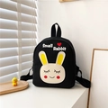 Detail of black canvas backpack for toddlers featuring a cute white rabbit and heart design - Black