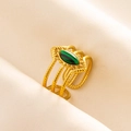 Close-up of golden multi-layer twist ring with green stone on beige silk fabric - Adjustable Open / Gold-Malachite
