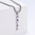 Detail of silver liquid metal style pendant with square box chain on a white block - Letter I (Pendant Only)