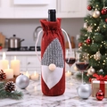 Christmas gnome wine bottle cover with red and grey knit design in festive kitchen setting - Red Cover Grey Hat Gnome
