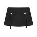 Elegant black A-line mini skirt with rhinestone bow details in a flat lay view - XS / Short Skirt / Black