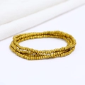 Detail view of multi-layer gold beaded chain jewelry with elegant white fabric background - #37(All Gold)