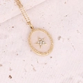 Detailed macro of gold star pendant with zircon on a beige background surface - Beige Enamel Rhinestone Star Oval Style (15#)