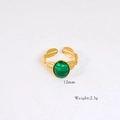 Detail of 14k gold plated ring with a 12mm green malachite stone and leaf textures - Malachite Feather Texture Style
