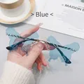 Fashionable butterfly shaped rimless sunglasses with blue lenses and silver metal temples - Blue