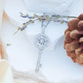 Elegant silver rotating heart butterfly key pendant necklace with sparkling zircons - Rotating Key (XL1194)