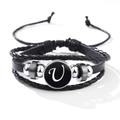 Braided black leather bracelet featuring a silver-tone metal charm with stylized letter U - Letter-U