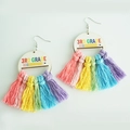Close-up of 3rd Grade teacher earrings with rainbow cotton tassels and wood engraving - 3rd Grade