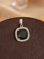 Close-up of square emerald green gemstone pendant with double halo of micro-pave diamonds - Silver Emerald Green